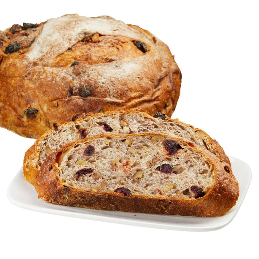 Rustic round bread with cranberries and walnuts
