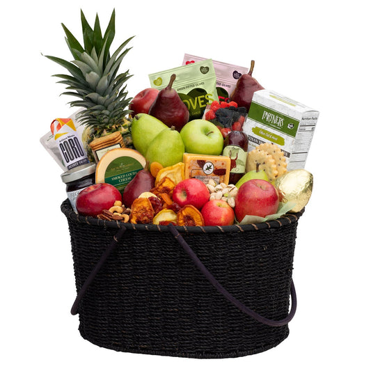 Gift fruit basket with pears apples pineapple salami and gouda