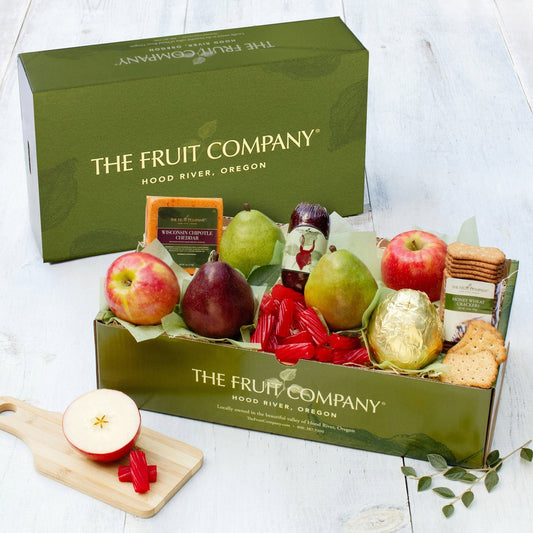 Covered Bridge fruit gift basket with assorted gourmet snacks