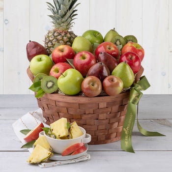 The Fruit Company Columbia River fresh fruit basket with pears apples pineapple and kiwi