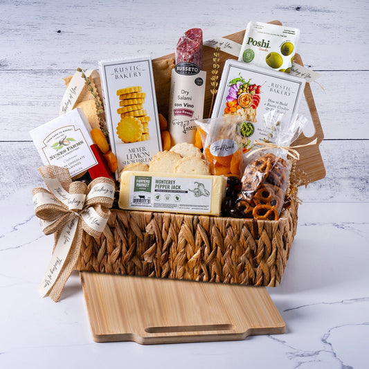 Thinking of You gift basket with cookies nuts and cutting board