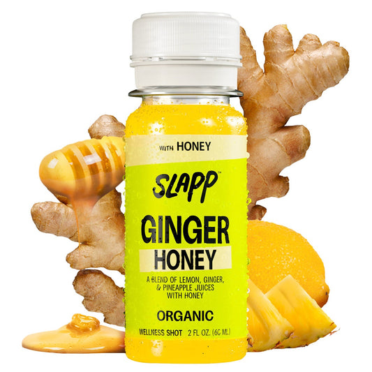 Vegan cold pressed ginger and honey beverage shots