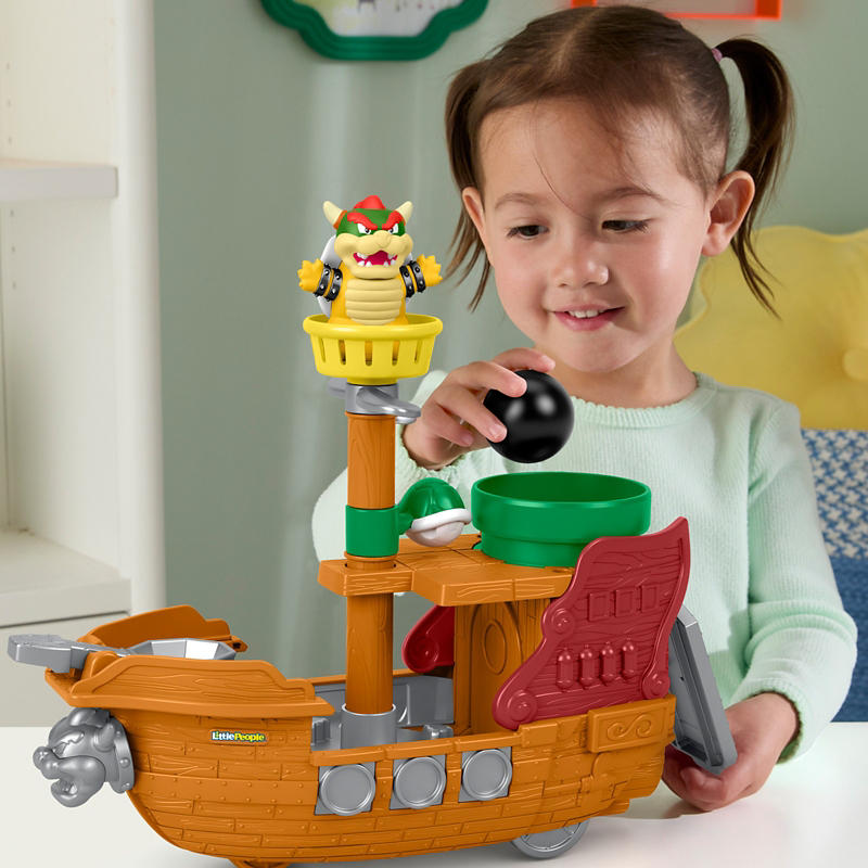 Toddler playset with trapdoor pipe and wave motion