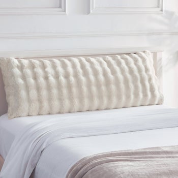 Ivory faux fur body pillow with soft bubble texture