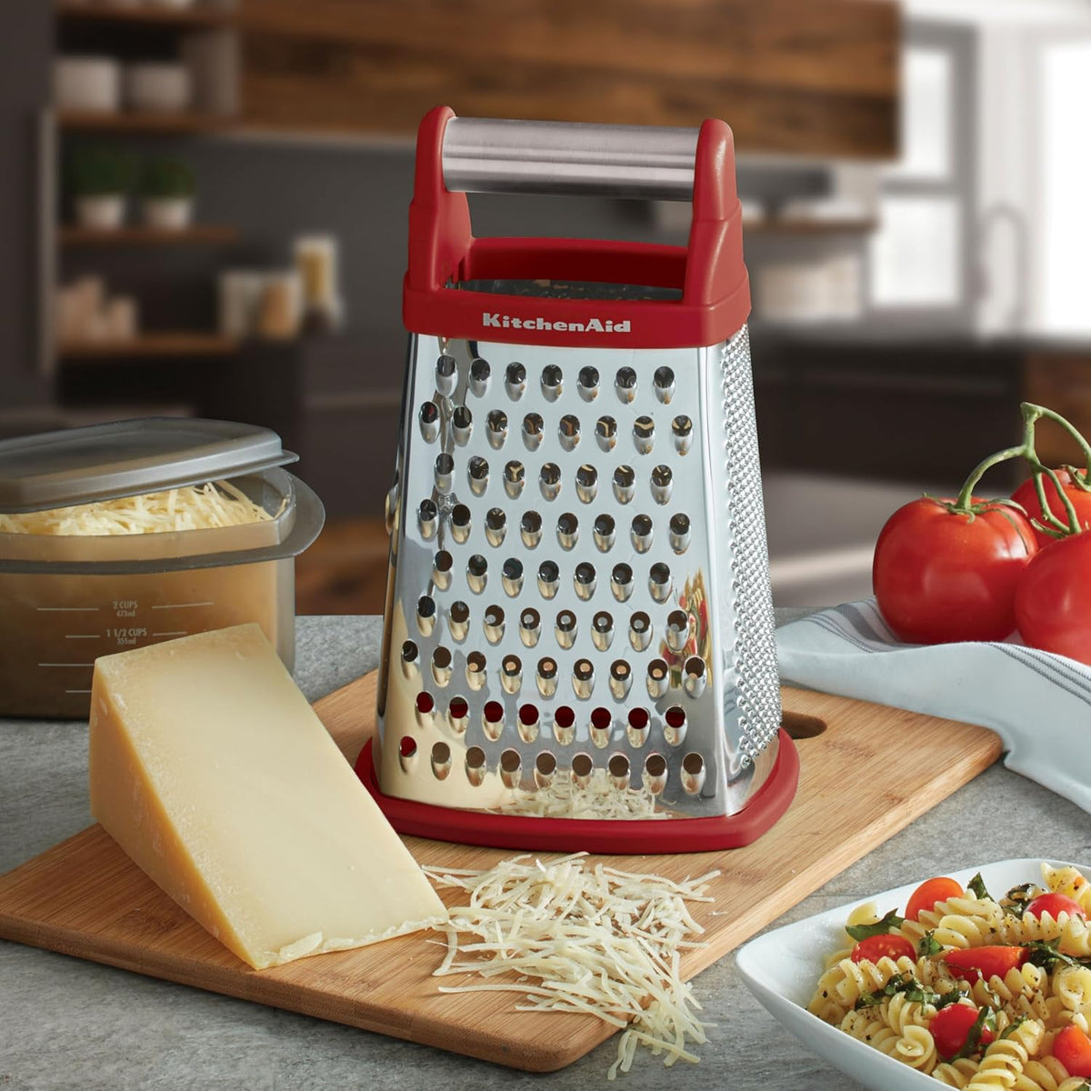 KitchenAid grater with marked 2-cup container and lid