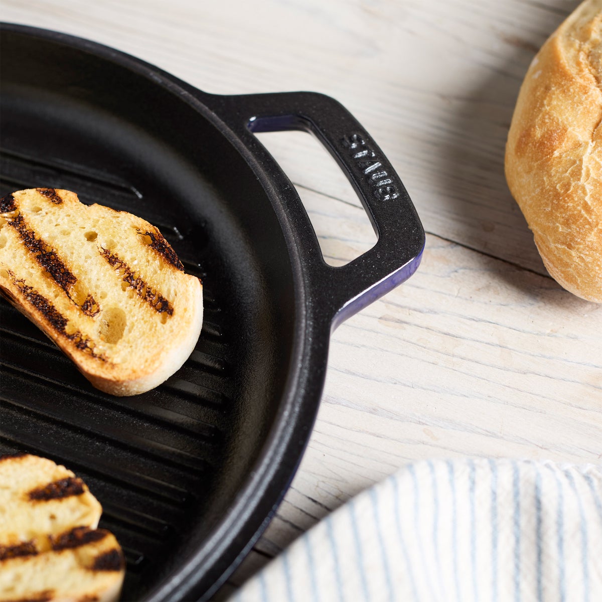 Dark blue Staub cast iron braise and grill pot