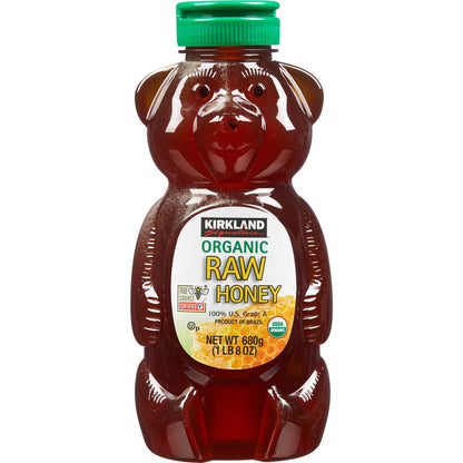 Organic raw honey in honey bear plastic jar