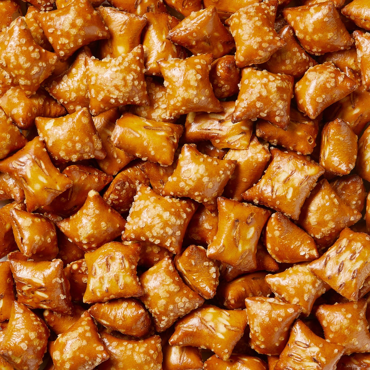 Crunchy peanut butter pretzel bites in family-size container