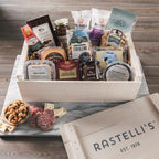 Holiday gift basket with chocolates and deli items