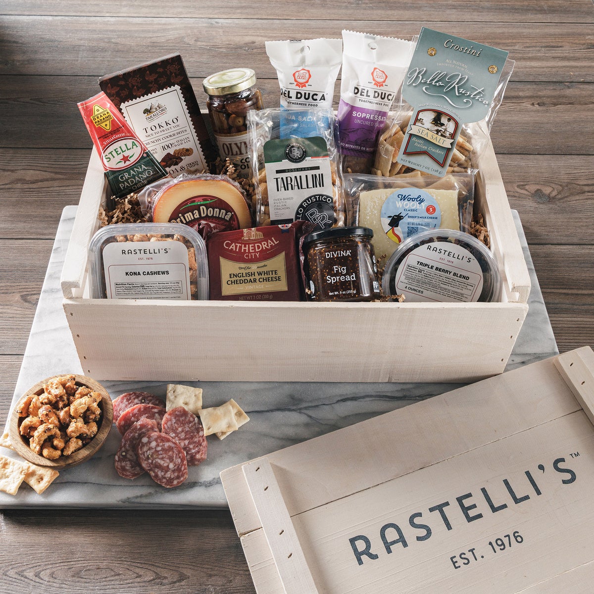 Holiday gift basket with chocolates and deli items