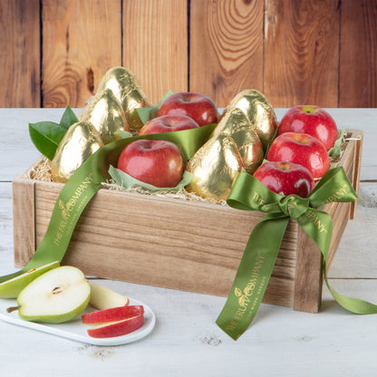 Wooden crate with apples and pears