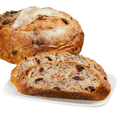 Rustic round bread with cranberries and walnuts
