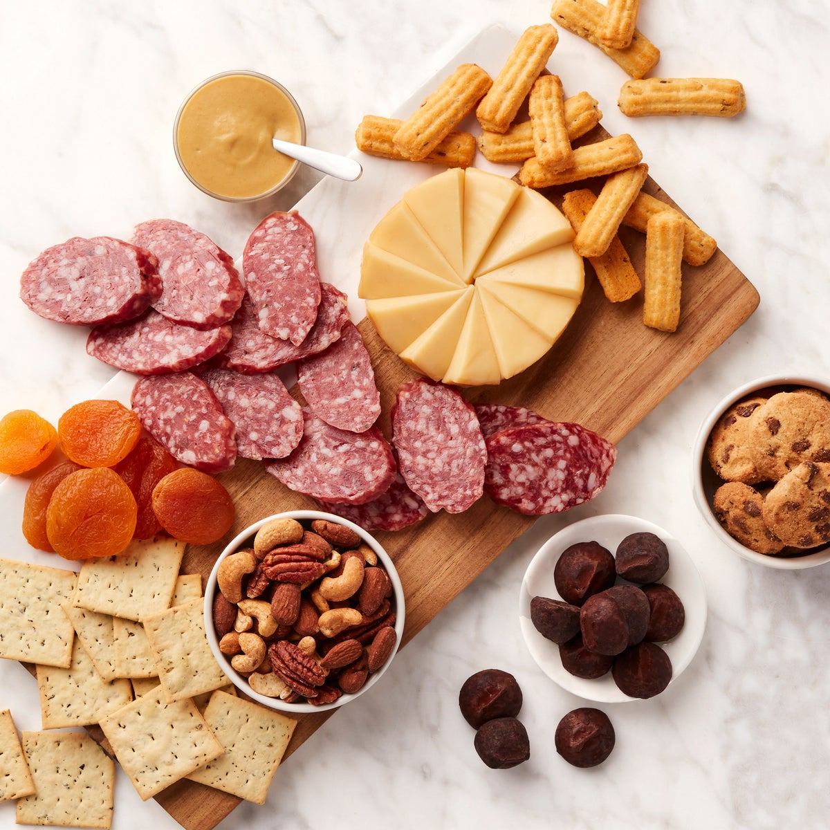 Gift basket with salami, cheese, and nuts