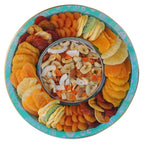 Decorative spring tin tray with dried fruit assortment