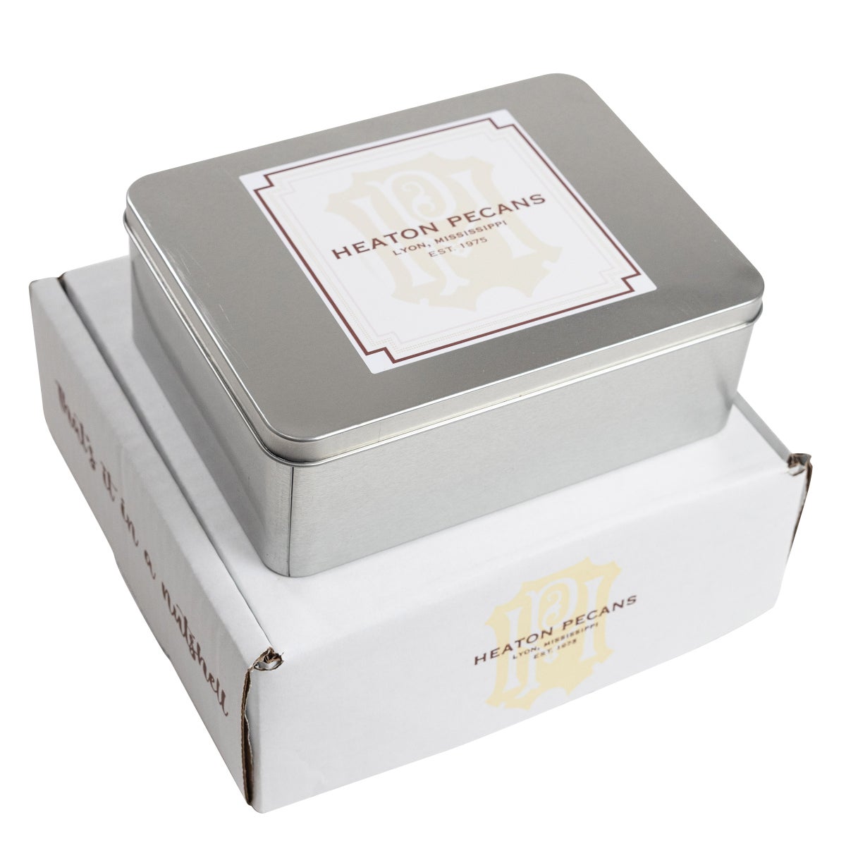 Milk chocolate pecans in square metal tin