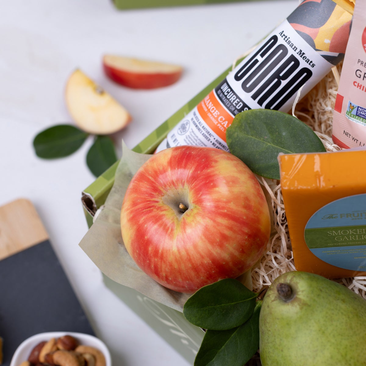 Green Anjou pears in a fruit gift basket