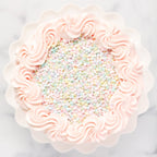 Pastel confetti topped bakery cake