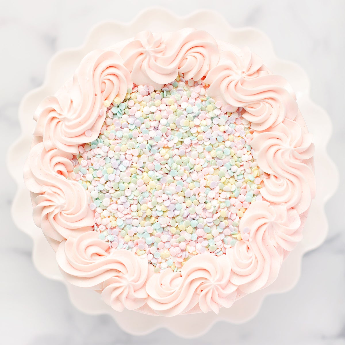 Pastel confetti topped bakery cake