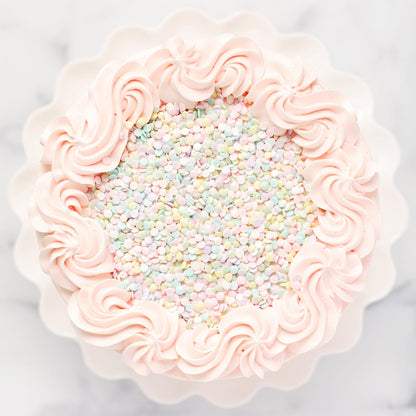 Pastel confetti topped bakery cake