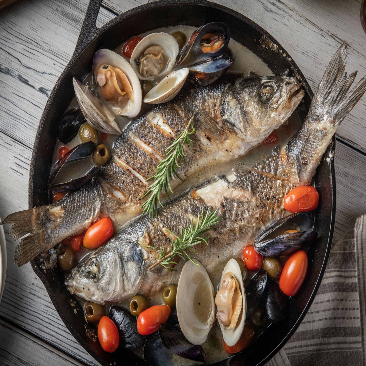 Frozen cleaned branzino fish for cooking