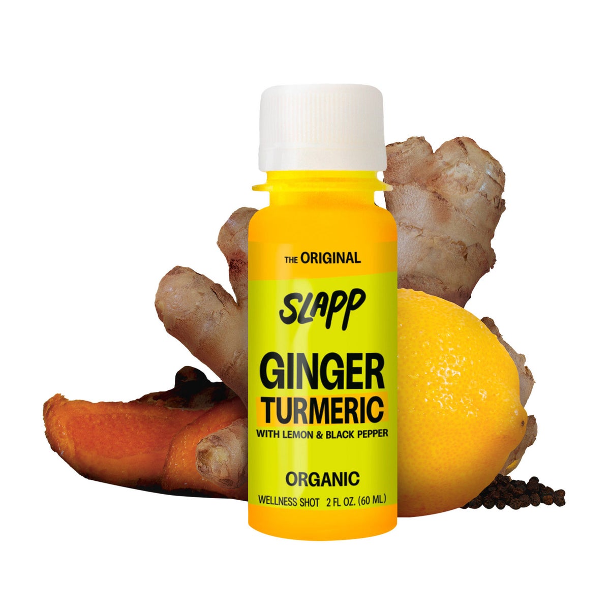 Vegan cold-pressed ginger and turmeric beverage shots