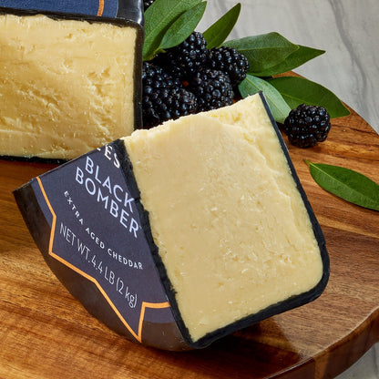 Black Bomber cheddar cheese wheel approximately 4.4 lbs