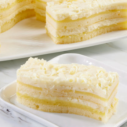 Pre-cut lemon dessert cake with white chocolate mousse