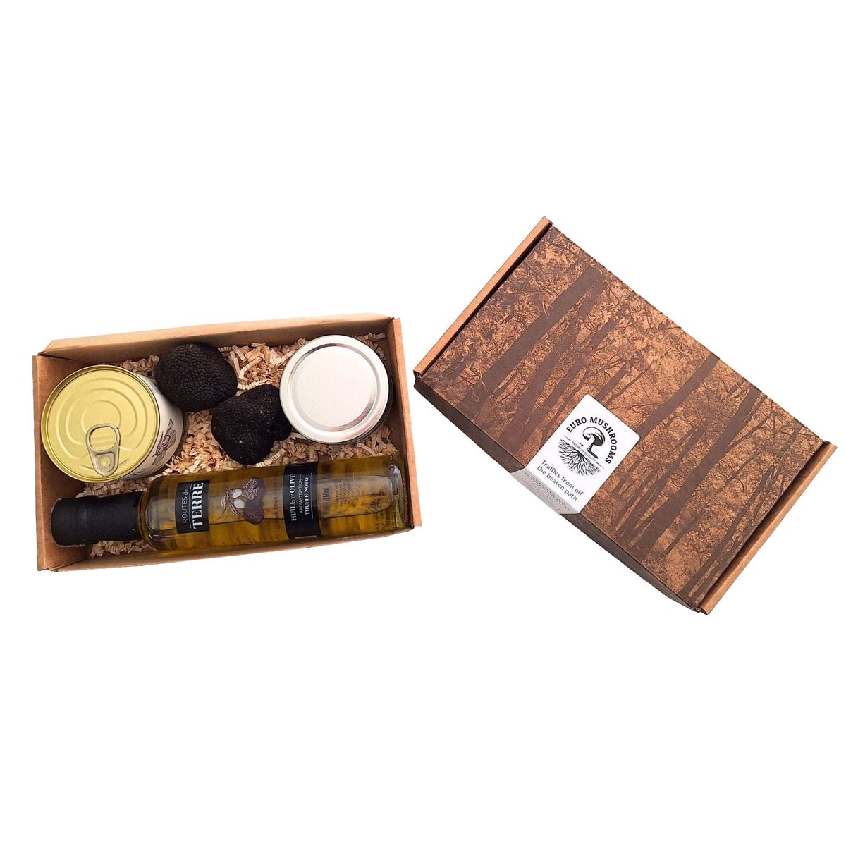Fresh winter truffles with gourmet truffle accessories