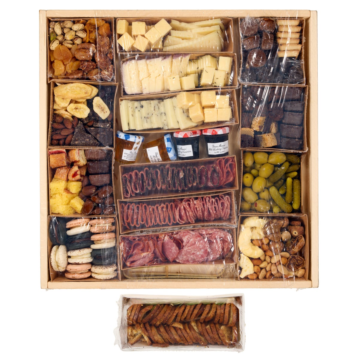 Sweet and savory snack board with crackers and fruit