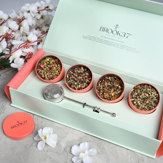 Four tin loose leaf herbal tea collection