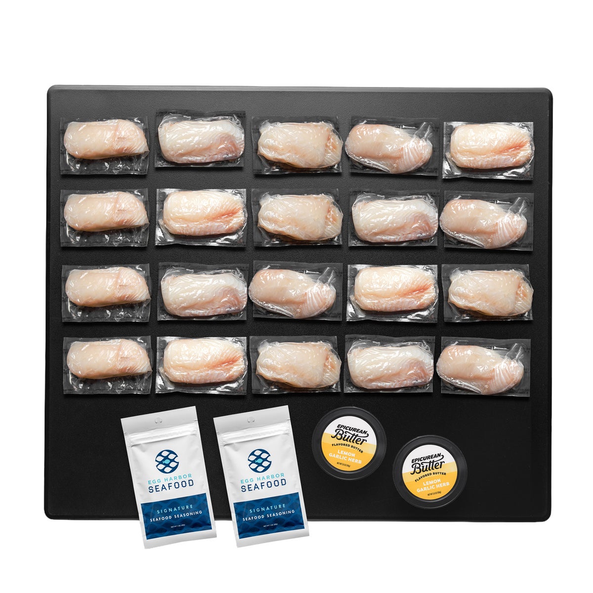 Vacuum-sealed cod fillets with seasoning and butter