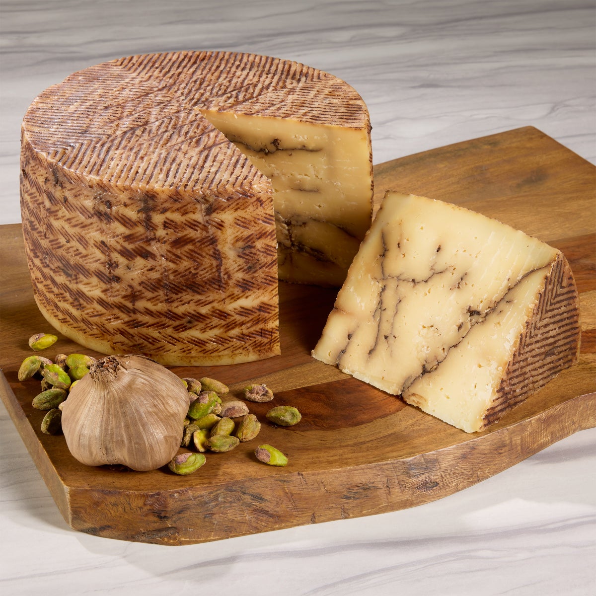 Don Juan black garlic sheep’s milk cheese full wheel