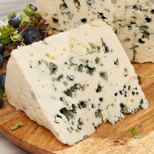 French sheep’s milk blue cheese half wheel