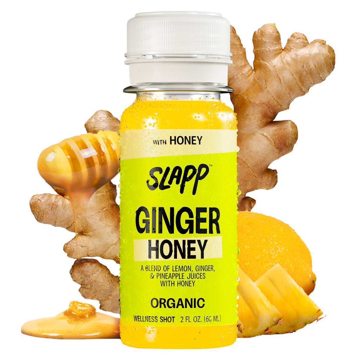 Vegan cold pressed ginger and honey beverage shots