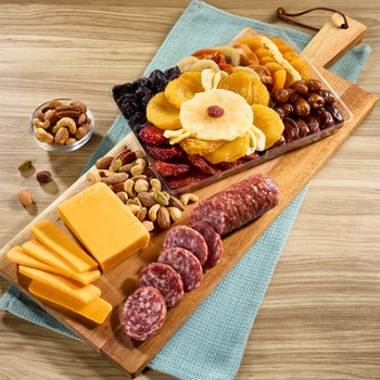 Vacaville Fruit Company dried fruit nut meat and cheese charcuterie tray with acacia board