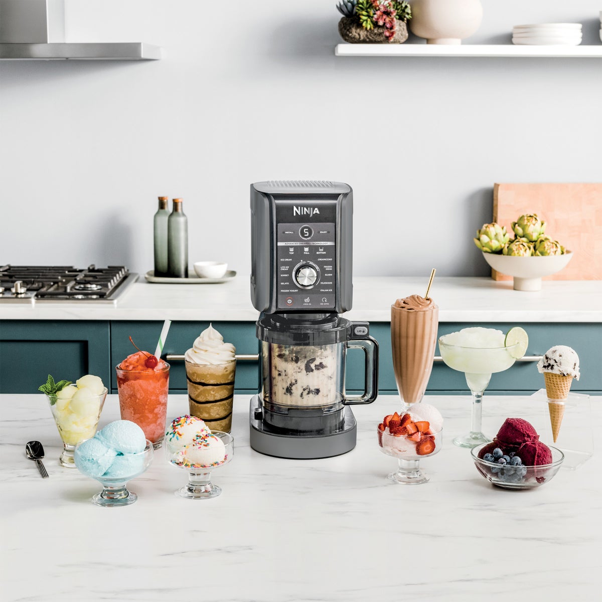 Ninja CREAMi Deluxe maker with included 24 oz pints