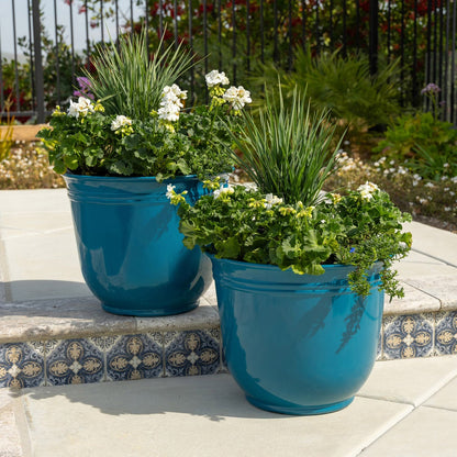 Hand-painted Trendspot resin planter pair