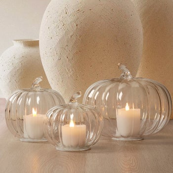 Set of three amber glass pumpkin LED light candles