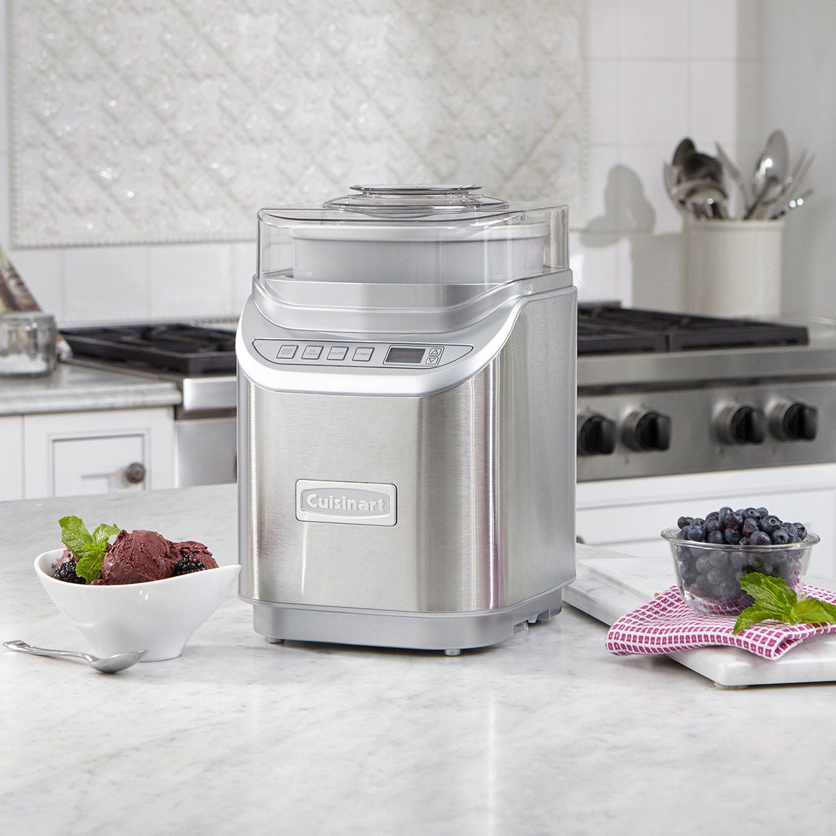 Ingredient spout with measuring cup on ice cream maker