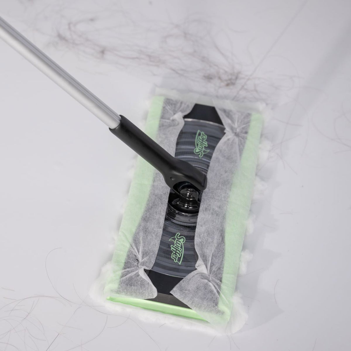Swiffer sweeping kit with collapsible pole