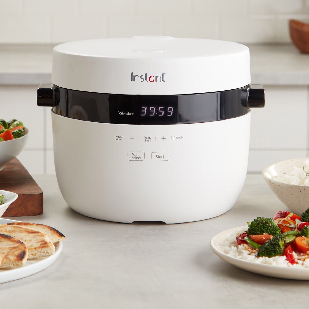 Instant Pot cooker with steam basket