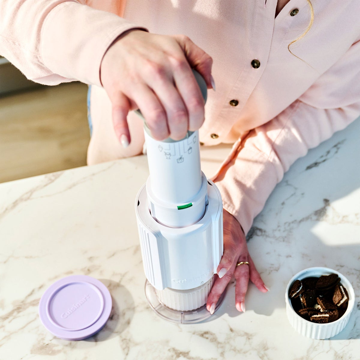 Compact frozen treat maker with cord wrap storage