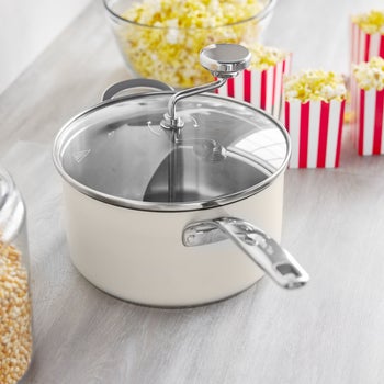 GreenPan stainless steel stovetop popcorn popper in cream