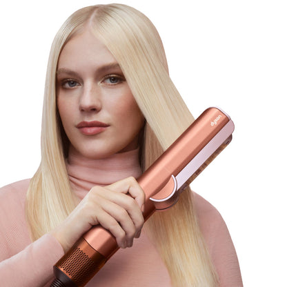 Dyson Airstrait sleek styling tool in red
