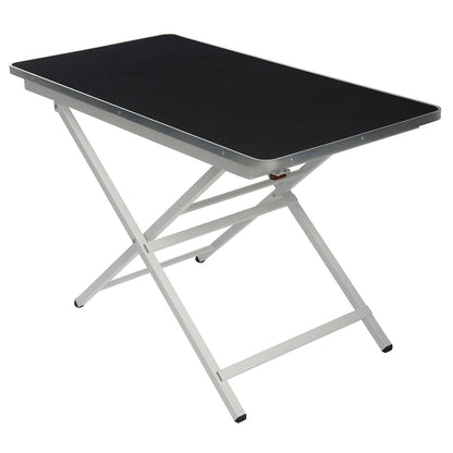 Portable pet grooming table folded for storage