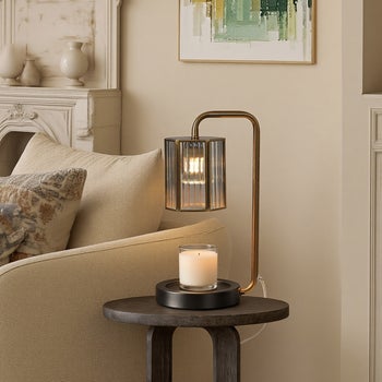 StyleCraft clear glass shade candle warmer with antique brass finish