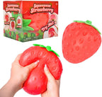 Vibrant red strawberry squeeze toy for ages 3 and up
