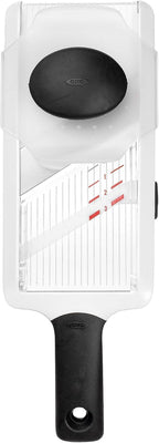Compact kitchen slicing tool with food holder