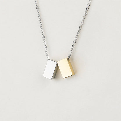 Gold- and silver-tone cube jewelry by Anavia