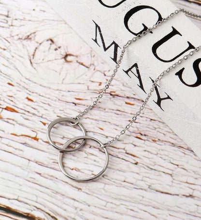 Delicate stainless steel necklace with three circle pendants